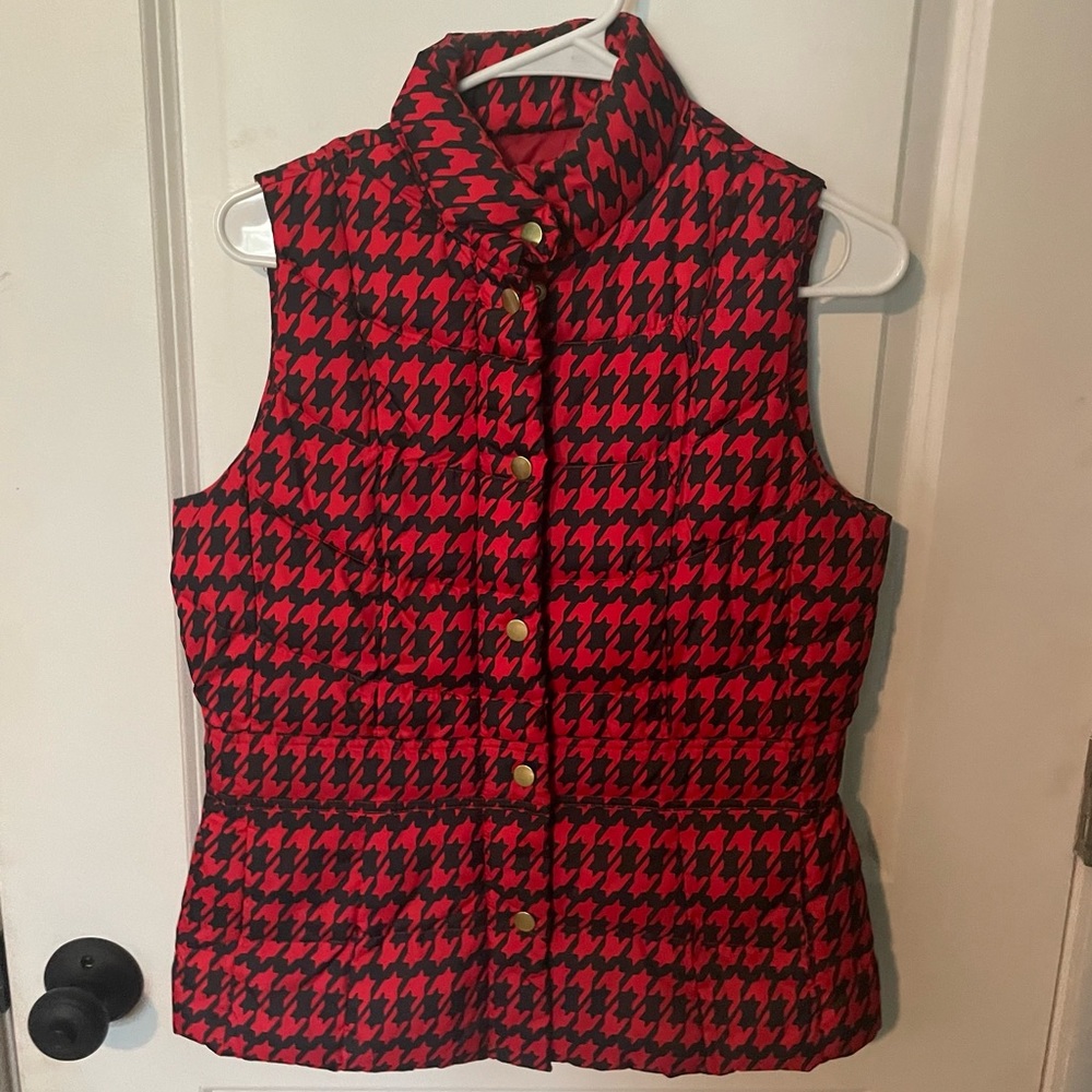 Red and black houndstooth buddy vest. With hidden zipper front and gold snaps